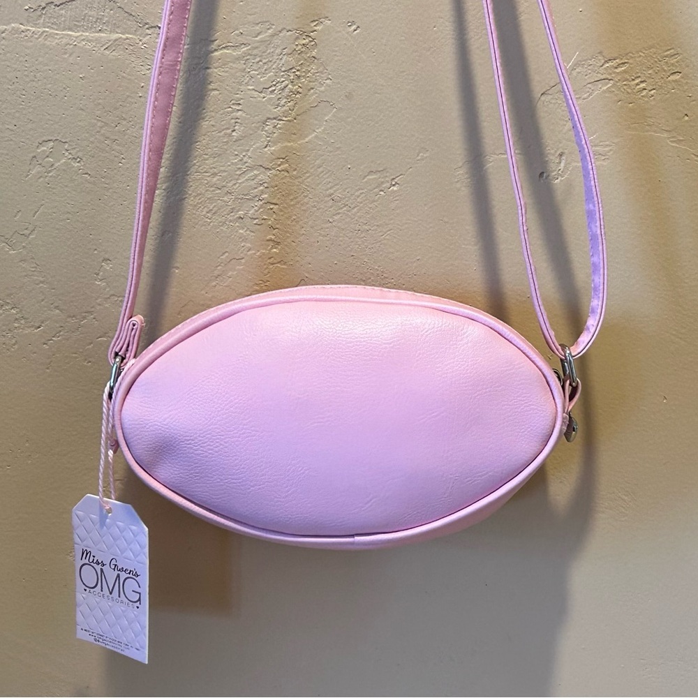 MISS GWENS OMG ACCESSORIES BUBBLE GUM PINK IRIDESCENT FOOTBALL CROSSBODY NWTS - Picture 2 of 10